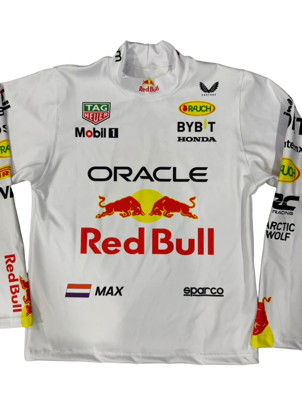 A white long-sleeve Oracle Red Bull Racing team shirt with various sponsor logos including Red Bull, TAG Heuer, Mobil 1, and Bybit, laid flat on a gray marble-patterned surface.